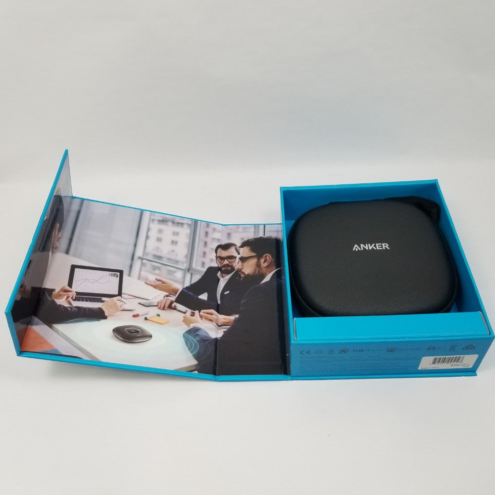 Anker product in a blue box with an image of people working on a laptop.