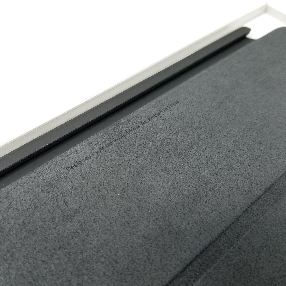 Tiny manufacturer inscriptions on the inner surface of Apple Smart Cover for iPad mini 4th & 5th Gen.