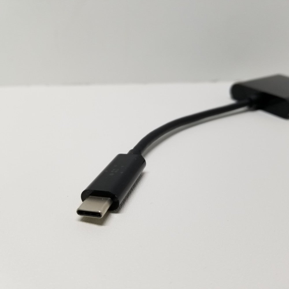 Male end of black USB-C cable on a white background