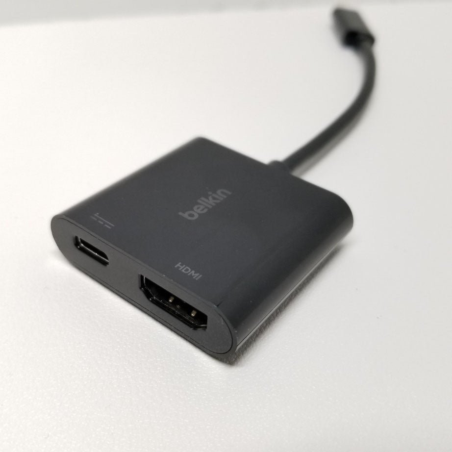 Black Belkin adapter with HDMI and USB-C ports on a white background