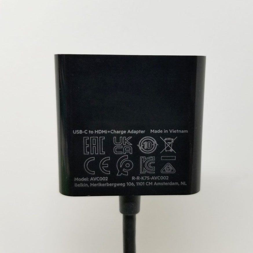 Black USB-C to HDMI+Charge Adapter with certification logos on a white background