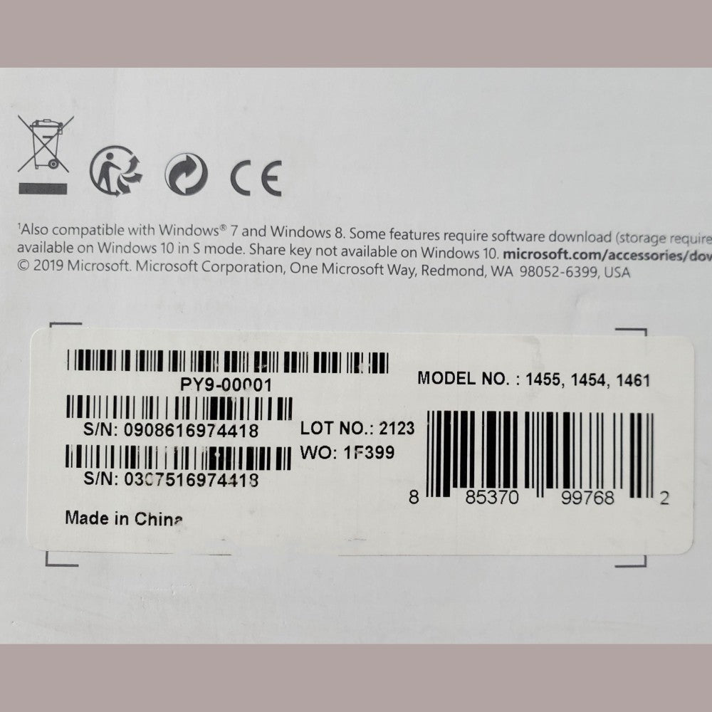 Sticker tag showing part number, UPC on bottom of keyboard from Microsoft wireless desktop 850 combo.