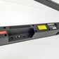 Back view of Insignia 2.0 soundbar with ports and labels on a white background