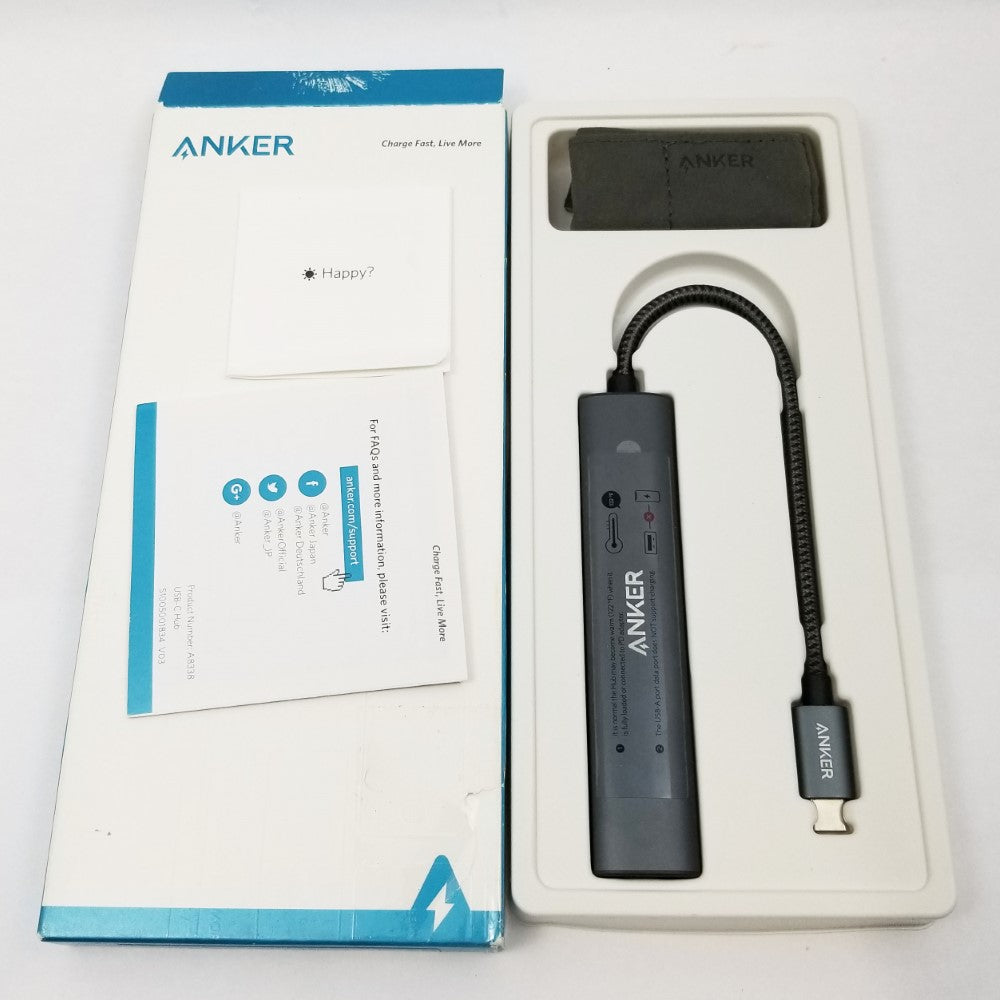 ANKER Premium 5-in-1 USB-C hub displayed next to its packaging and a carry pouch.