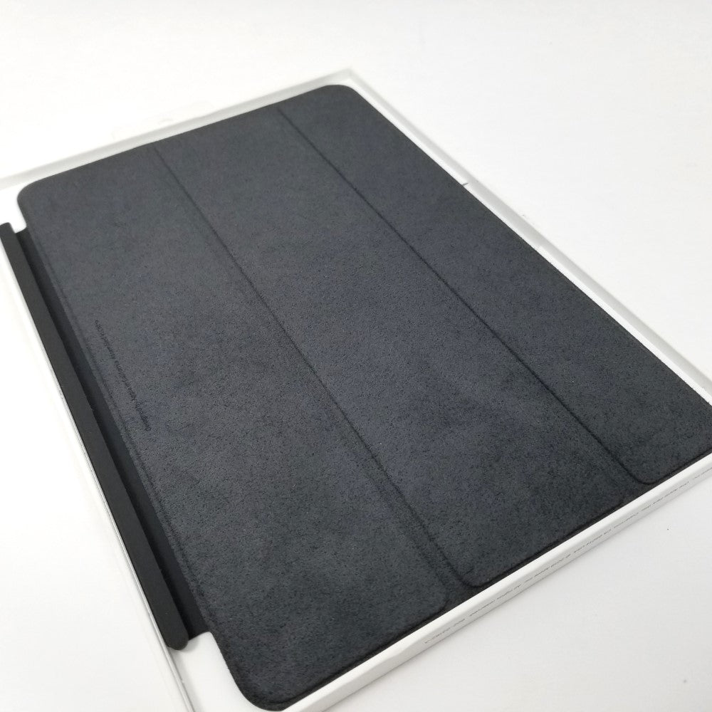 Soft fabric on the inner surface of APPLE Smart Cover for Apple iPad mini 4th & 5th Gen on a white surface.