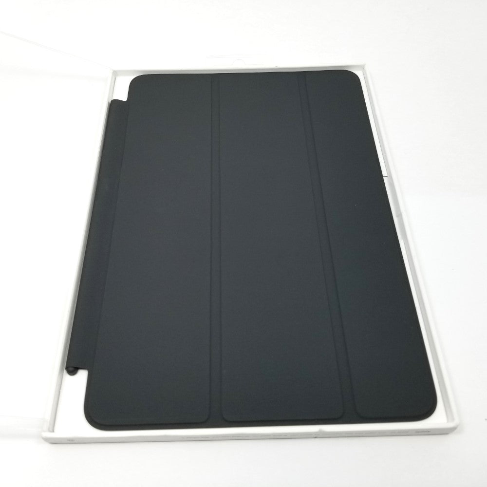 Black Apple Smart Cover for iPad mini 4th & 5th Gen in retail packaging lying flat on white surface.