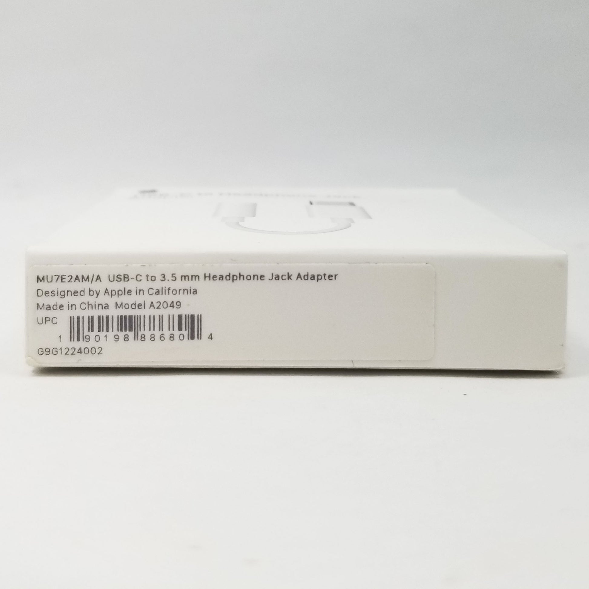 Manufacturer tag on lower surface of packaging showing model and UPC numbers