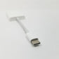Male USB-C tip of adapter in foreground against a white background