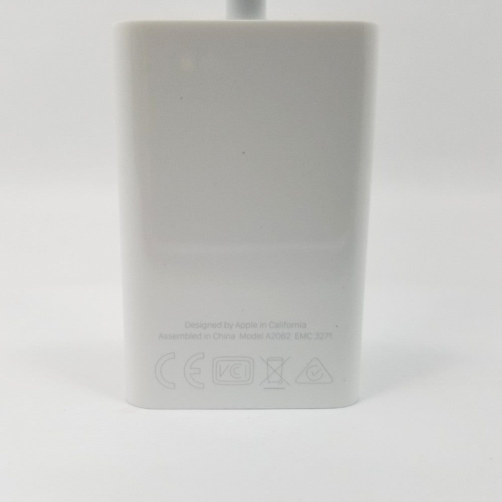 Back of USB-C to SD card reader showing manufacturer inscriptions including model number agaijnst white background