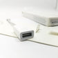 Close up of female port on Apple USB-C to USB-A adapter cable on a white background.