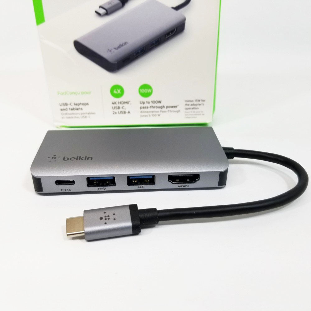 Belkin USB-C hub with multiple ports and a cable on a white background