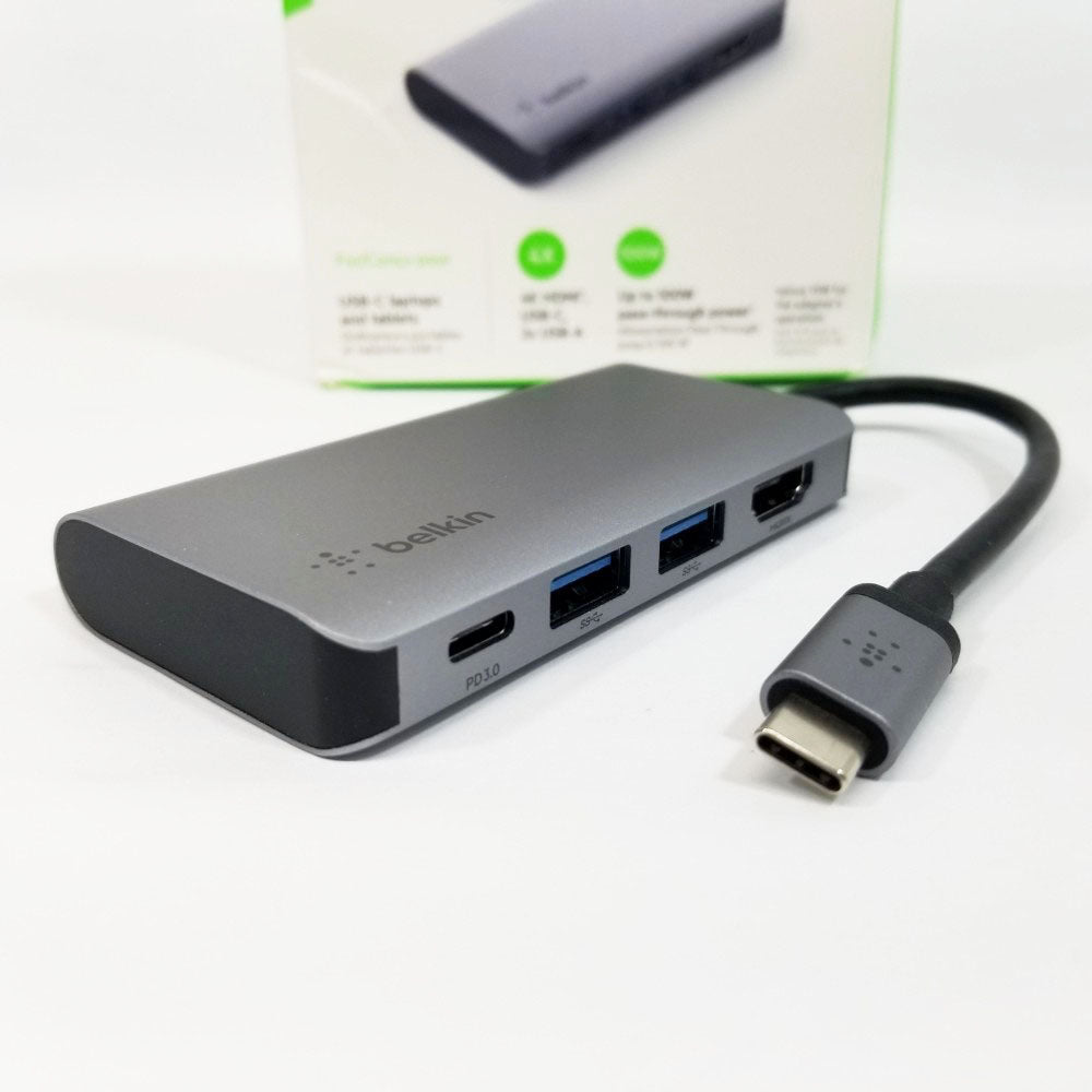Belkin USB-C hub with Male plug and multiple ports on a white background