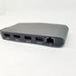 Gray Belkin docking station showing multiple ports on a white background