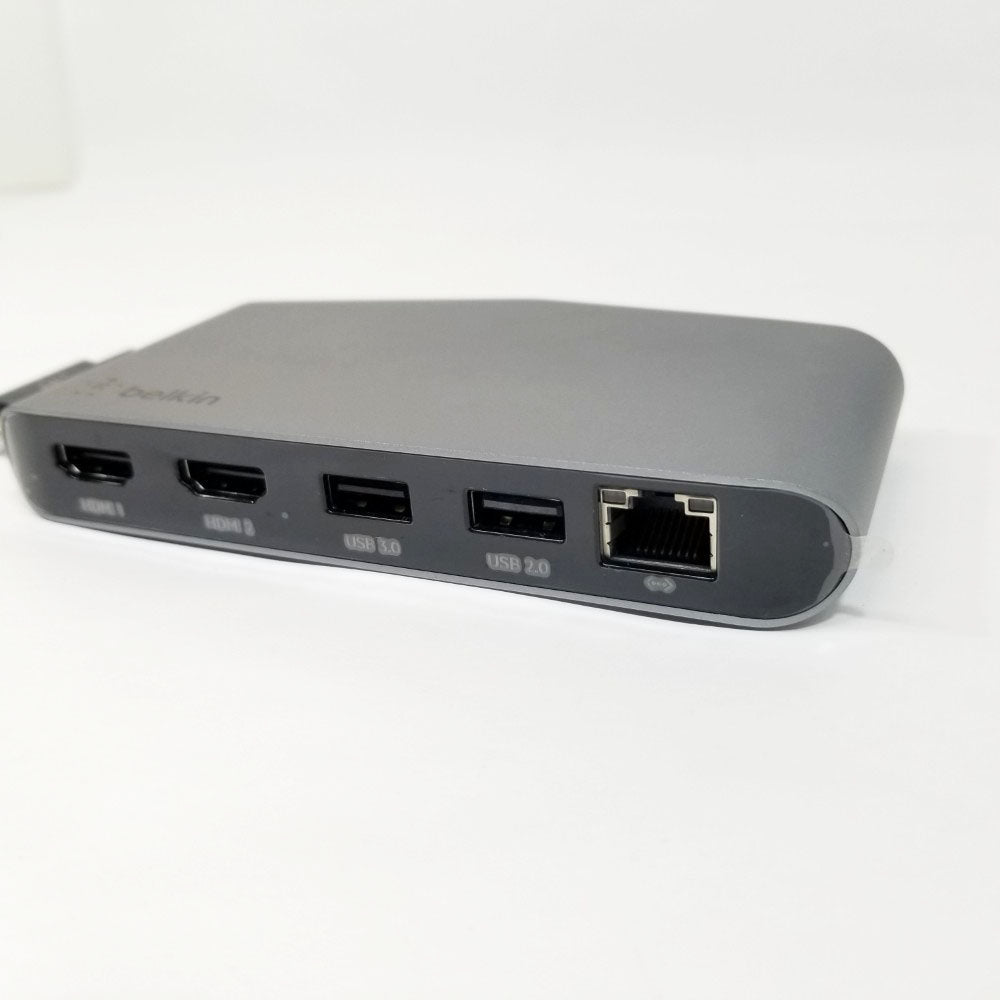 Gray Belkin docking station showing multiple ports on a white background