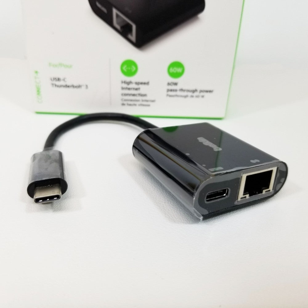 Network adapter showing USB-C and Ethernet ports on a white background