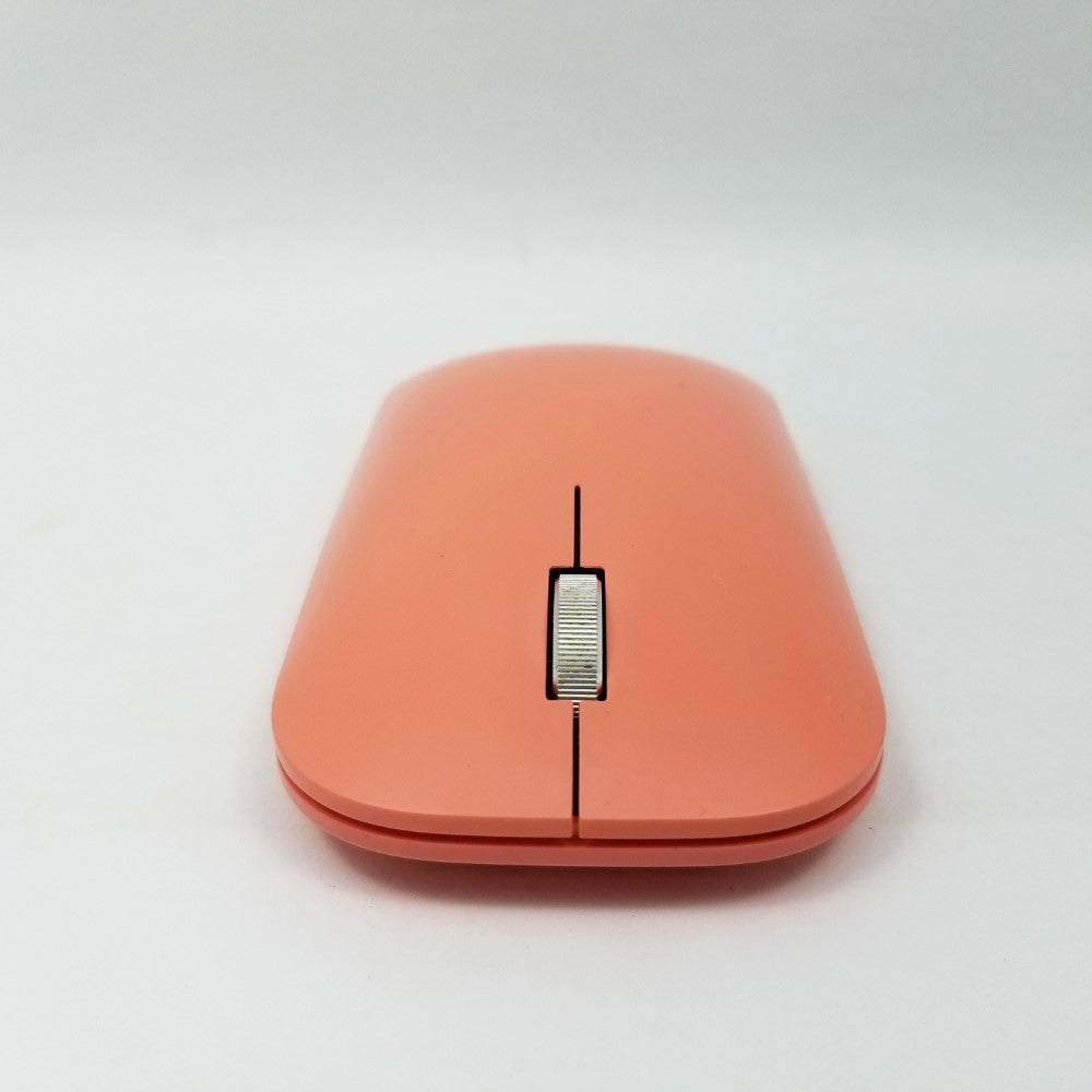 Front view of Peach Microsoft Mobile mouse showing scroll wheel.