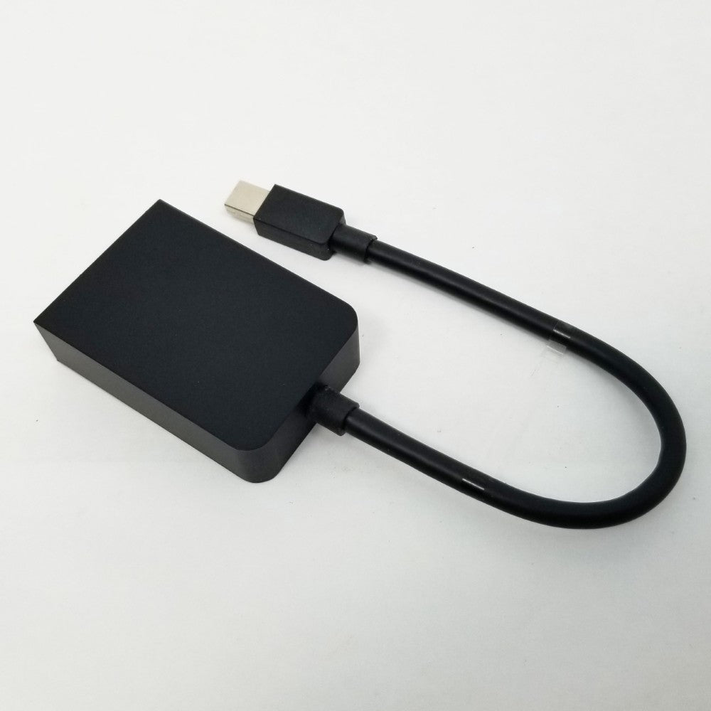 Top and back view of Minidisplay to VGA adapter cable.