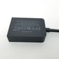 Minidisplay to VGA adapter showing certification logos on back side on a white background