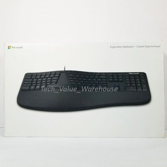 Microsoft Wired Ergonomic Keyboard in black color displayed on a box, with its image reflecting on the surface.