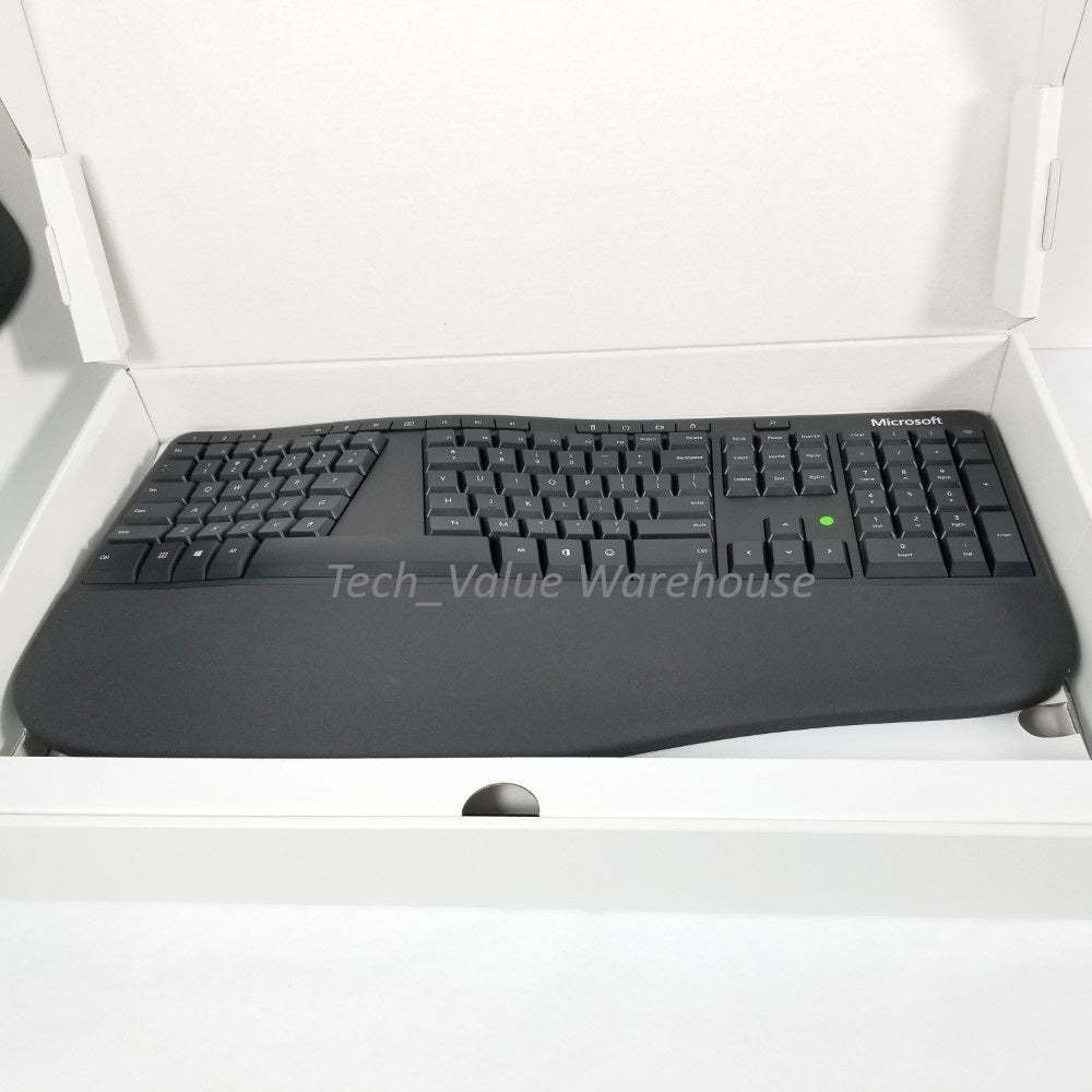 Microsoft ergonomic Keyboard sitting inside of open retail packaging