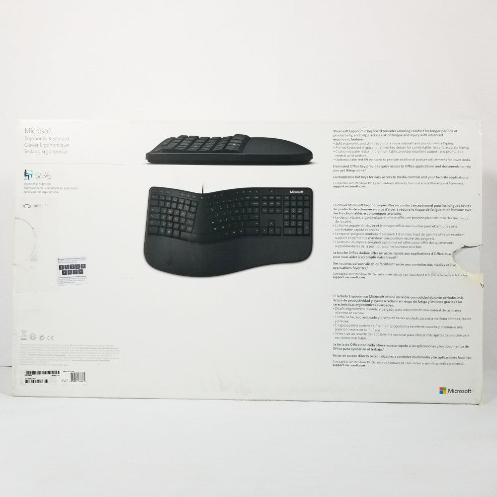 Showing under side of retail packaging for Microsoft ergonomic keyboard, with a picture of keyboard and manufacturer inscriptions and Microsoft Logo.