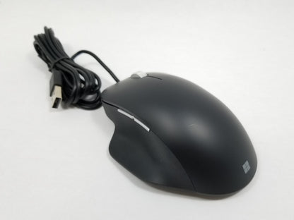 Black computer mouse with USB cable on a white background