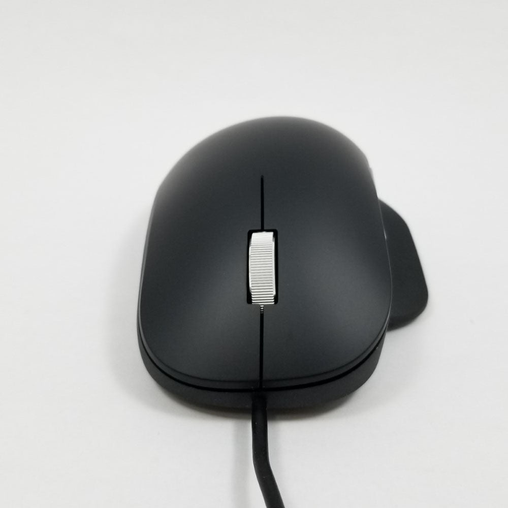 Black computer mouse on a light gray background