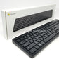 Microsoft Bluetooth keyboard QSZ-00001 and packaging on a white background with 'Tech Value Warehouse' branding.