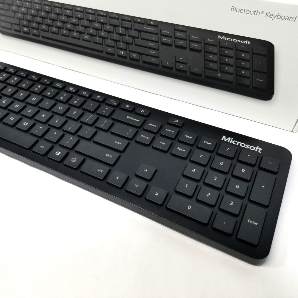 Right side Close-up of Microsoft Bluetooth keyboard QSZ-00001 on a white background