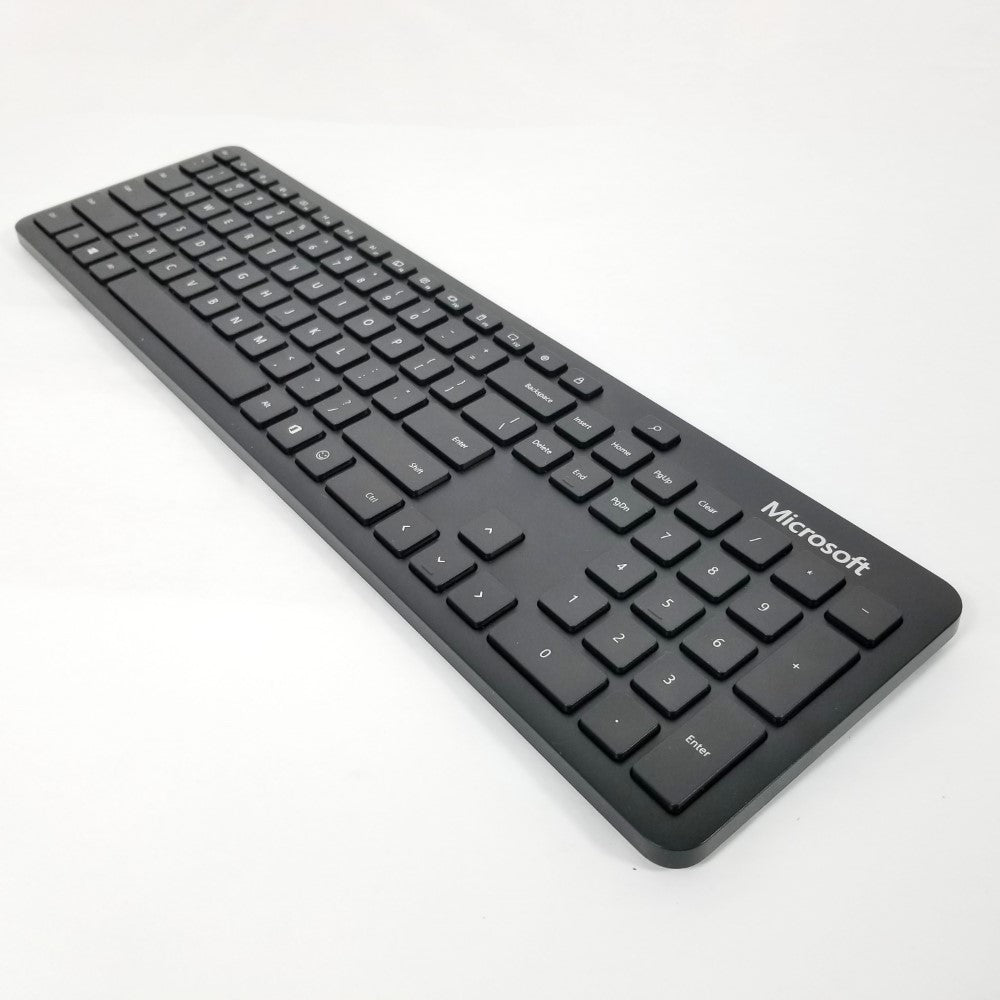 Right side close-up of Black Microsoft Wireless Bluetooth keyboard QSZ-00001 on a white background