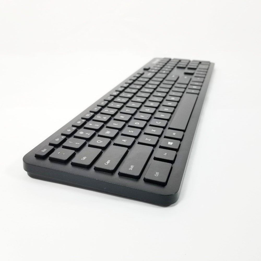 Left side view of Black Microsoft Wireless Bluetooth keyboard QSZ-00001 on a white background