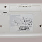 Close up of sticker tag on bottom of keyboard, showing part number and UPC code.