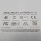 Close up of manufacturer inscriptions on the bottom surface of Nike adapt charging mat.