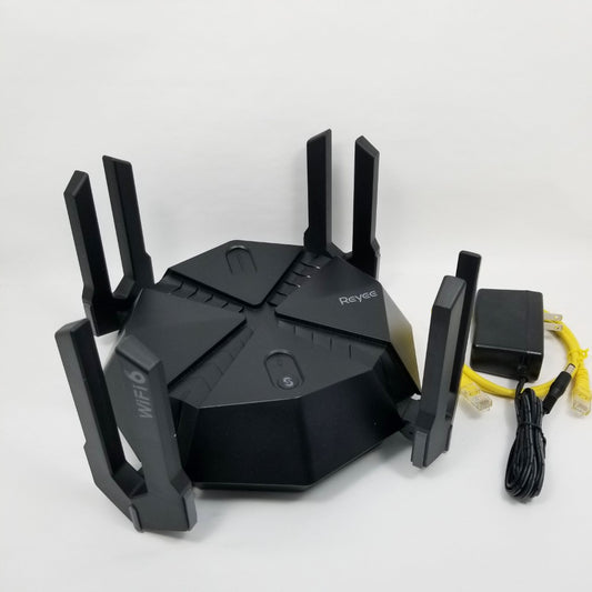 Black router with multiple antennas on a white background