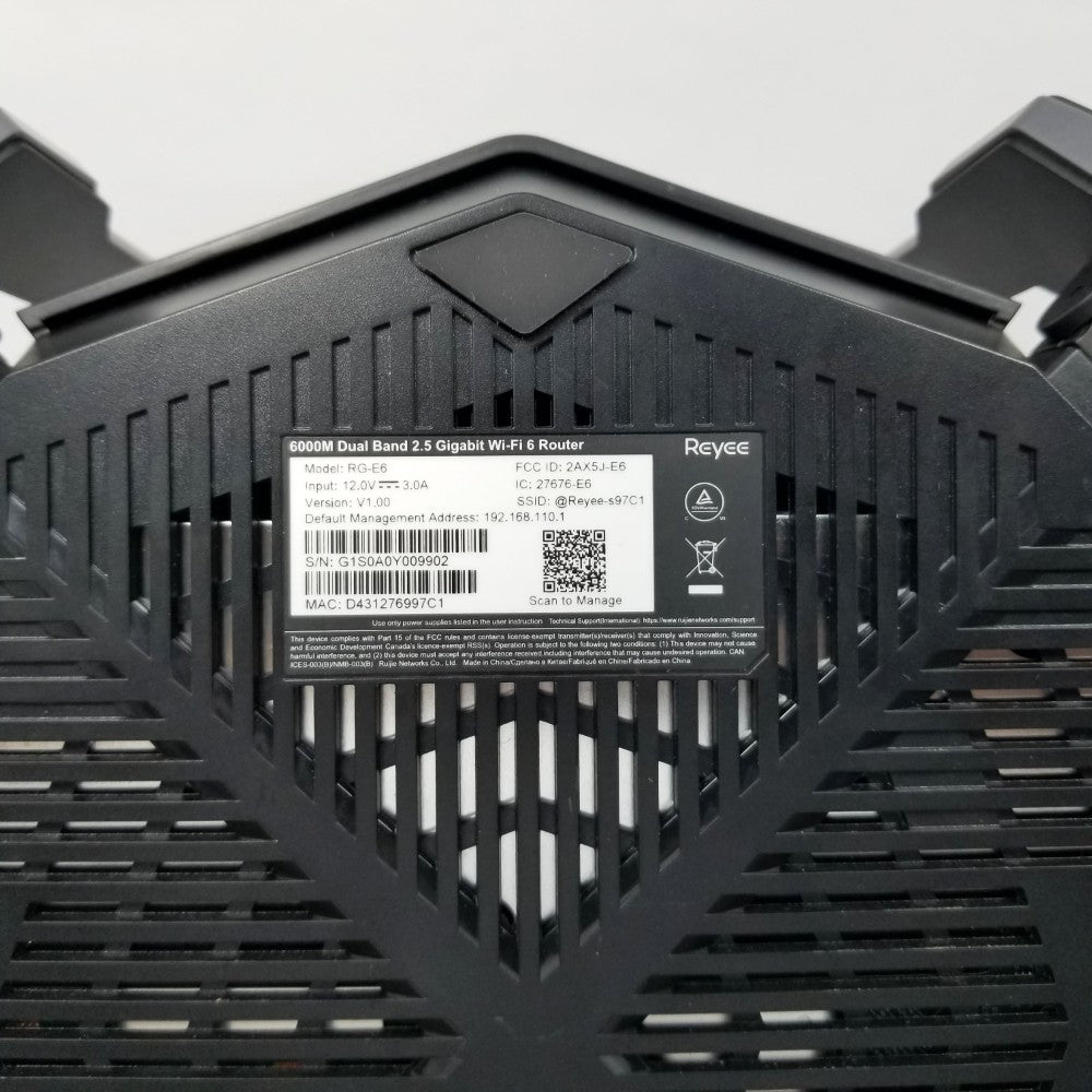 Black router showing bottom with part number label on a white background