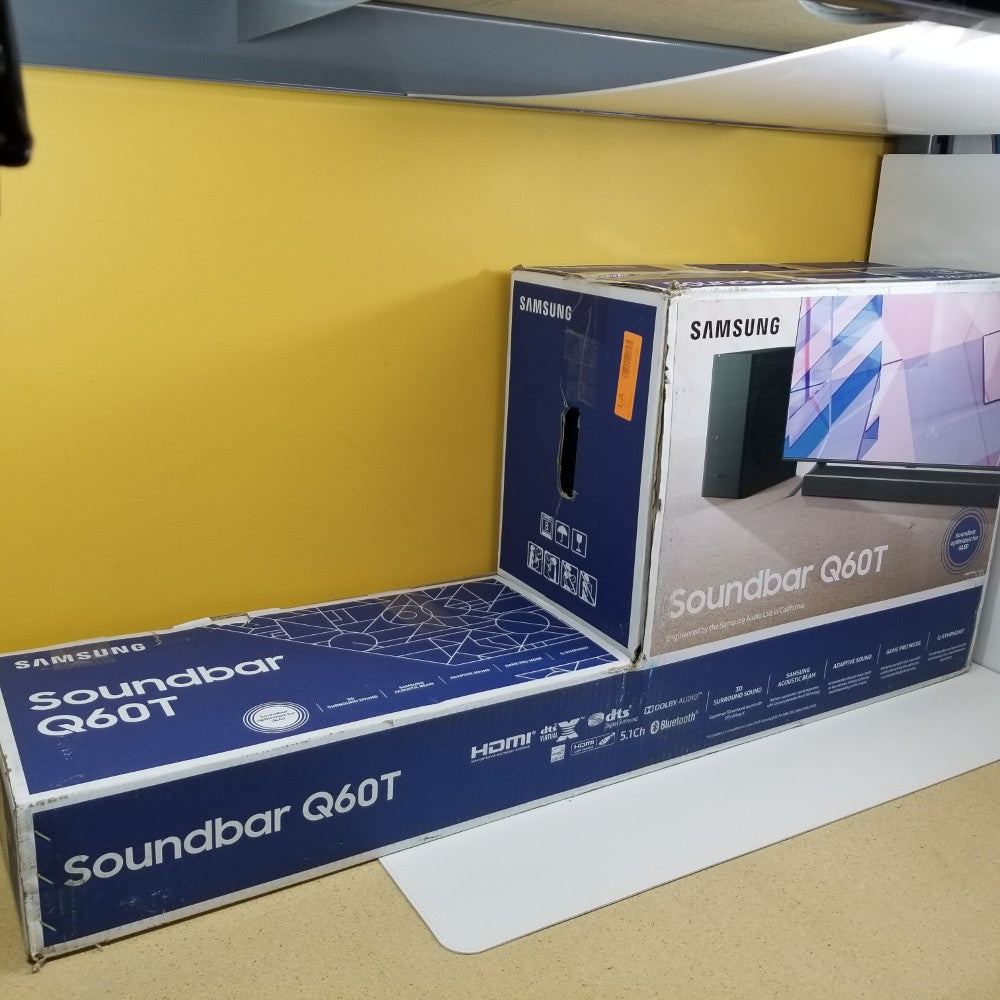 Samsung Soundbar Q60T packaging on a shelf