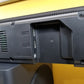 Back view of Samsung HW-Q60T with ports on a yellow background