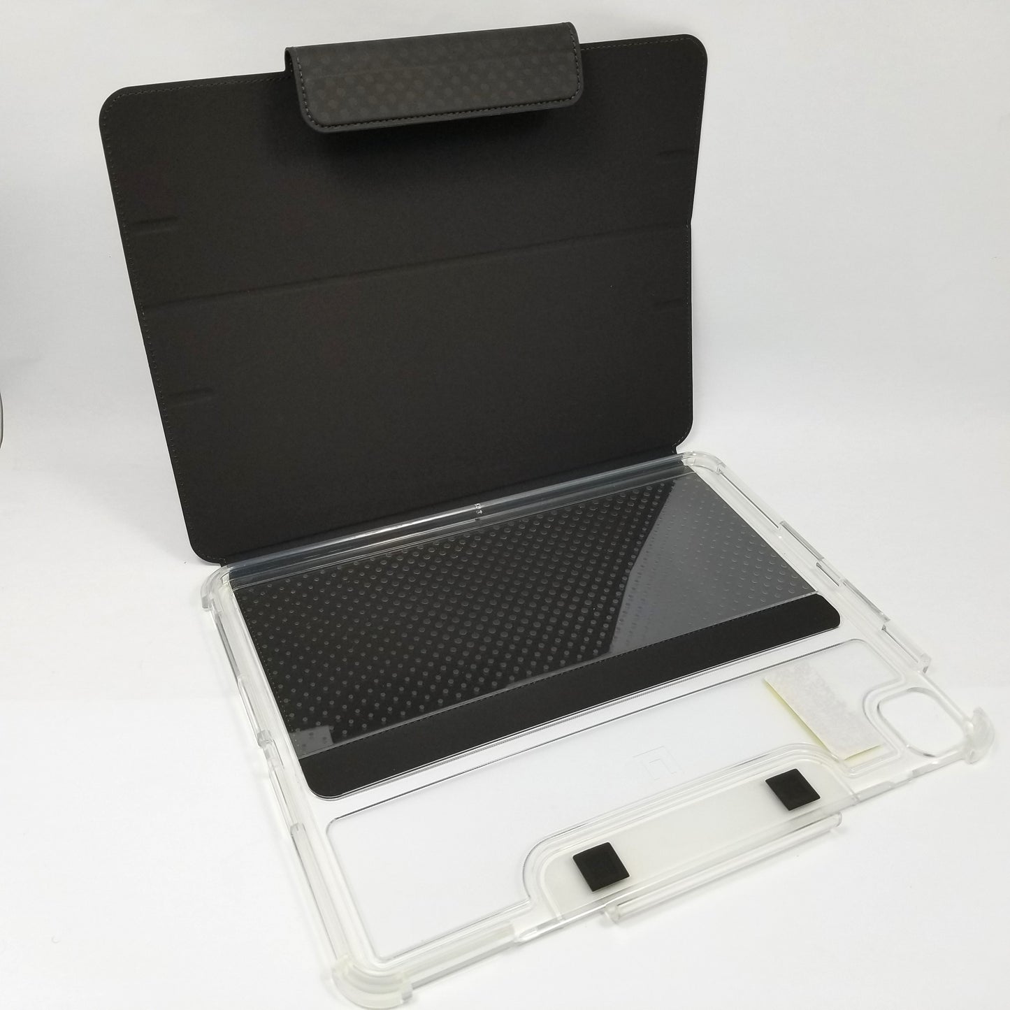 UAG Lucent case sitting with front cover opened up showing inner surfaces.
